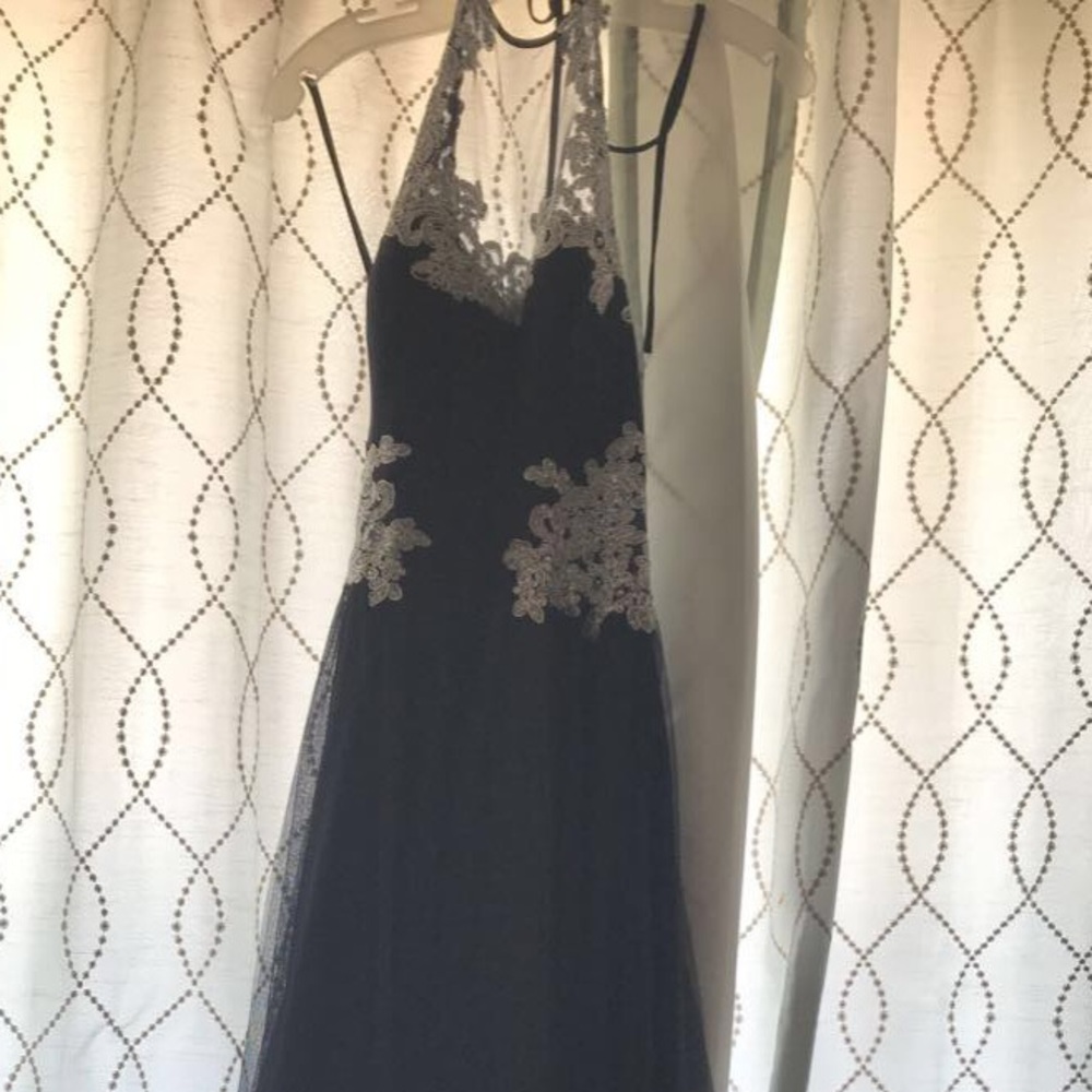 A navy blue dress with detailed top
